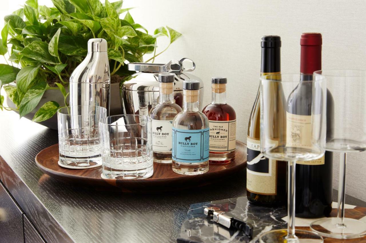 The Whitney Hotel Boston Exteriör bild A bar cart with a selection of liquor and wine